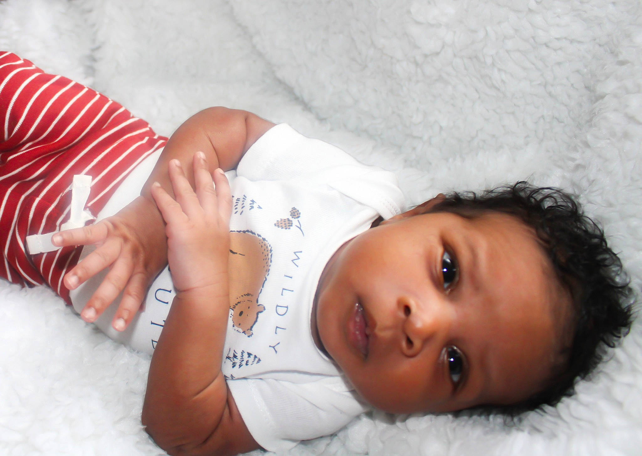 Zayne joined the competition — help win amazing prizes! chin, comfort, eyelash, face, glasses, happy, headgear, human, human_body, leg, lip, mammal, mouth, neck, nose, person, skin, textile, thigh, toddler