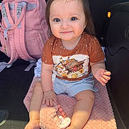 Kehlani joined the competition — help win amazing prizes! baby, child, smiling, tshirt, dog_print, pink_blanket, pacifier, car_interior, backseat, shorts, barefoot, cute, happy, toy, infant, young_child, clothing, seat, accessory, sunlight