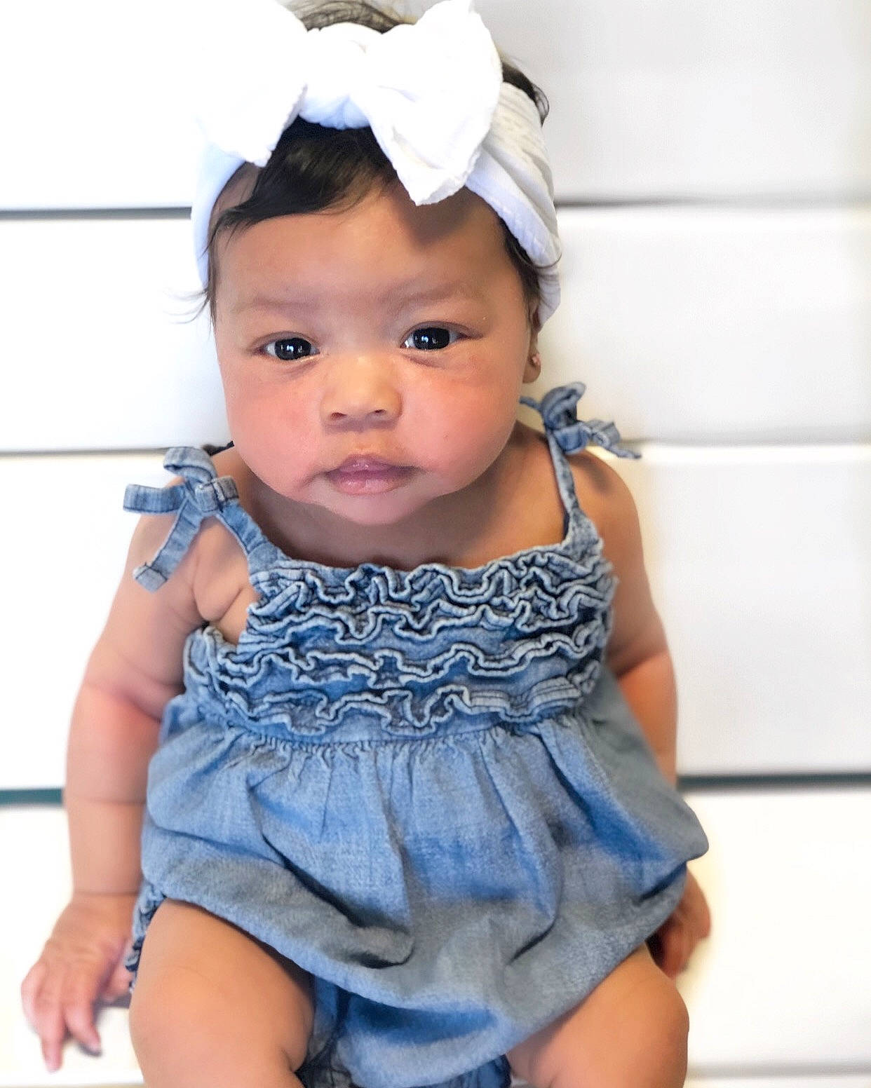 Kenzley Grace Hunter joined the competition — help win amazing prizes! baby, baby_products, baby_toddler_clothing, child, child_model, clothing, denim, dress, fashion_accessory, hair_accessory, headband, headgear, person, product, smile, textile, toddler