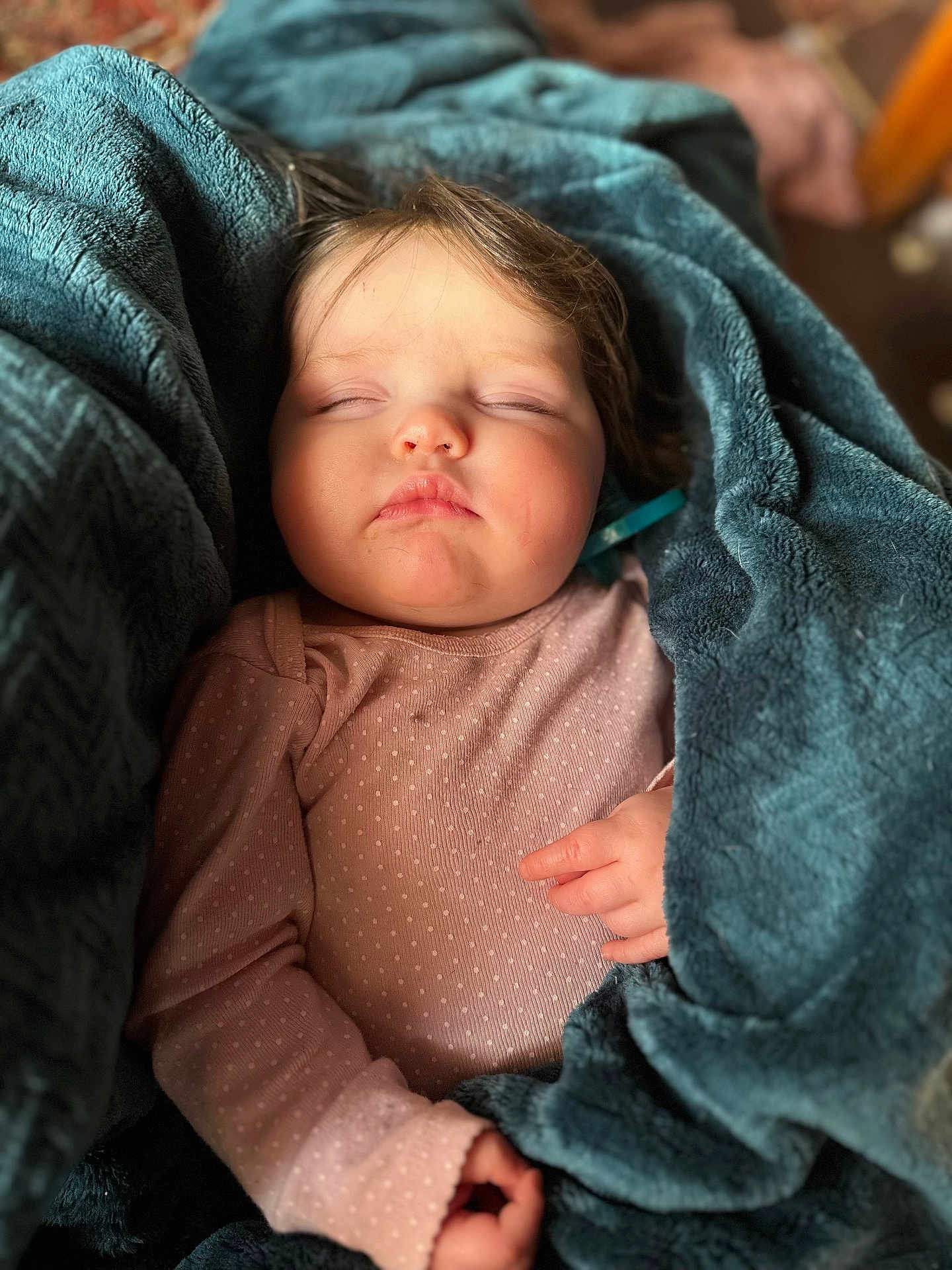 Ophelia is registered to the contest to win money with this photo: baby, sleeping, blanket, pink_clothing, cozy, child, infant, polka_dots, soft_texture, peaceful, portrait, closeup, cute, resting, hands, indoor, warm, comfort, tiny, face