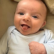 Rudi-Greyson joined the competition — help win amazing prizes! baby, infant, smiling, tongue_out, cute, happy, clothing, knitted_blanket, soft_toys, closeup, portrait, child, young, lying_down, cheeky, cozy, playful, indoors, face, hand