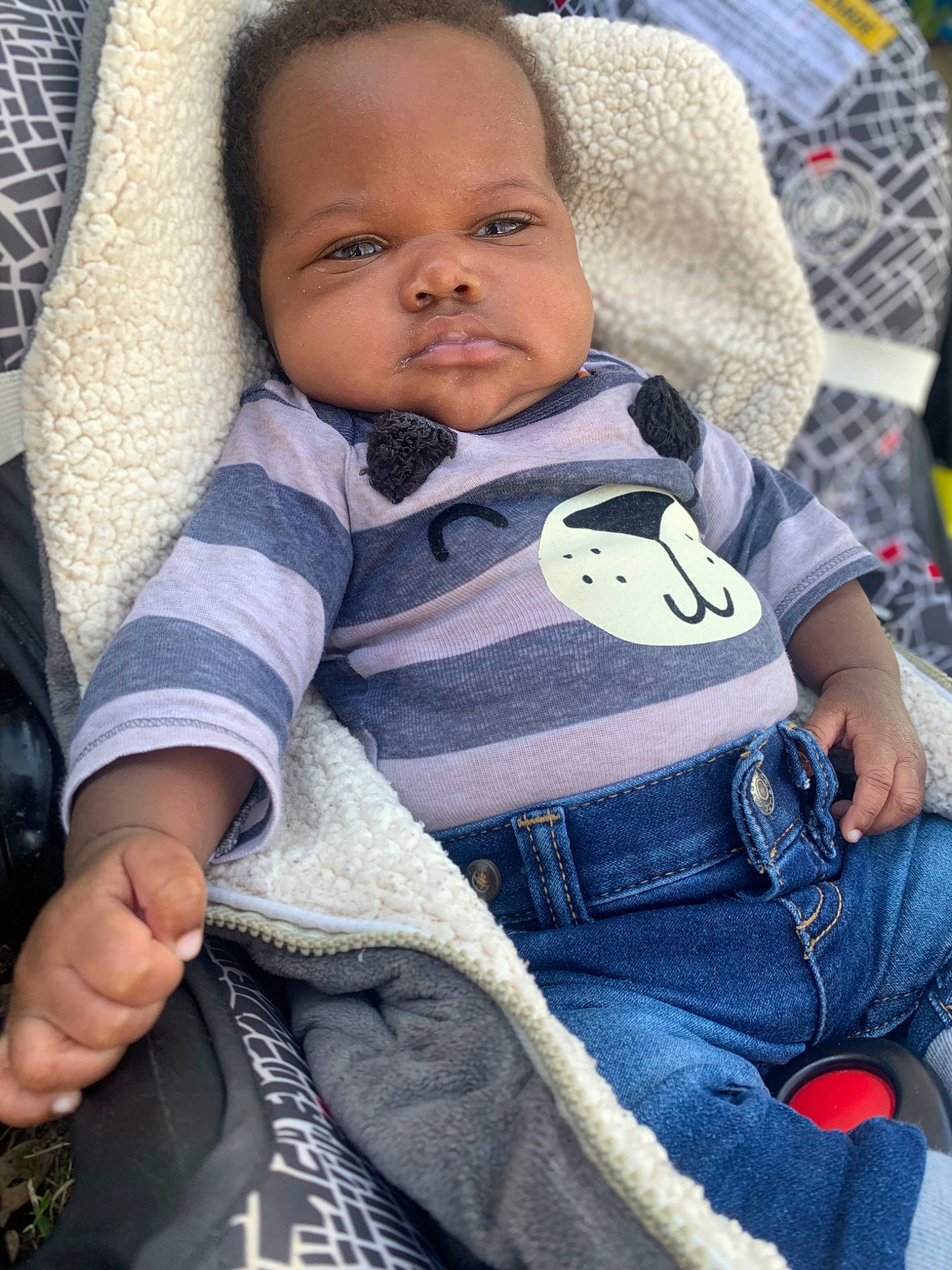 Dantae is registered to the contest to win money with this photo: baby, baby_toddler_clothing, beauty, cheek, child, comfort, cool, electric_blue, eye, gesture, iris, lip, nose, pattern, person, photograph, product, skin, sleeve, textile