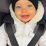 Leeroy a rejoint le concours — aidez-le/la à gagner de superbes lots ! baby, blue_eyes, beanie, car_seat, child, clothing, coat, cute, face, fashion, happy, infant, jacket, kid, portrait, safety_belt, smile, straps, toddler, warm_clothing