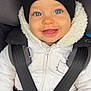 baby, blue_eyes, beanie, car_seat, child, clothing, coat, cute, face, fashion, happy, infant, jacket, kid, portrait, safety_belt, smile, straps, toddler, warm_clothing