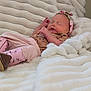 baby, bedding, blanket, boots, cozy, cute, fabric, feet, hand, headband, infant, lying_down, newborn, nursery, peaceful, pink_clothing, portrait, resting, sleeping, soft_texture