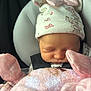 Harley joined the competition — help win amazing prizes! baby, newborn, infant, sleeping, car_seat, hat, mittens, blanket, pink, buckle, safety_label, warning_label, closeup, portrait, face, head, soft_toy, fabric, cozy, car_interior