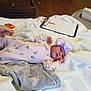 Wrenleigh is registered to the contest to win money with this photo: architecture, baby, bed, bedroom, blanket, bodypart, building, crib, face, finger, furniture, hand, head, hospital, indoors, infantbed, newborn, person, quilt, room