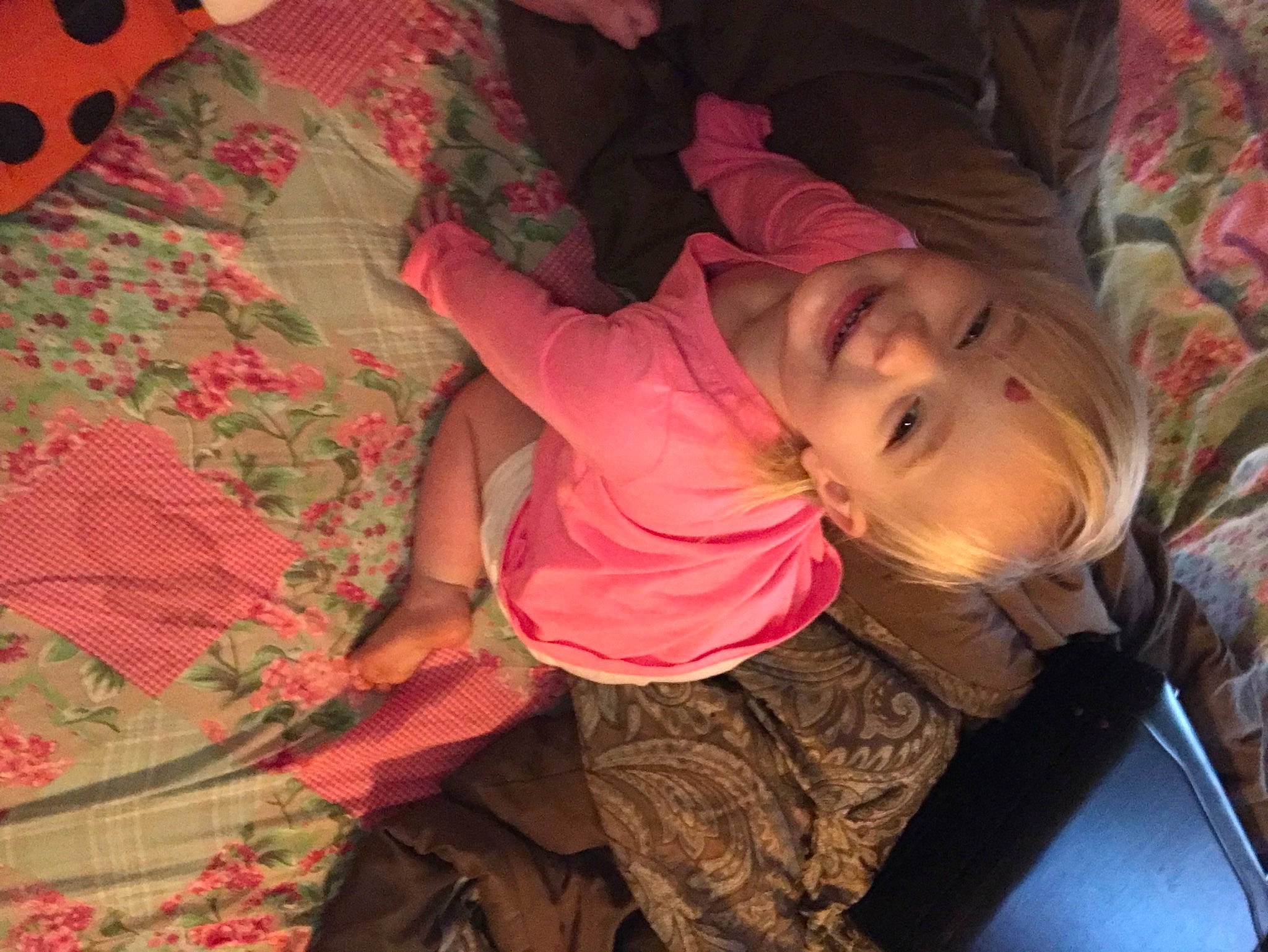 Lindsey joined the competition — help win amazing prizes! cheek, child, comfort, fun, grass, happy, joy, leaf, linens, magenta, pattern, peach, person, pink, room, skin, sleeve, smile, textile, toddler