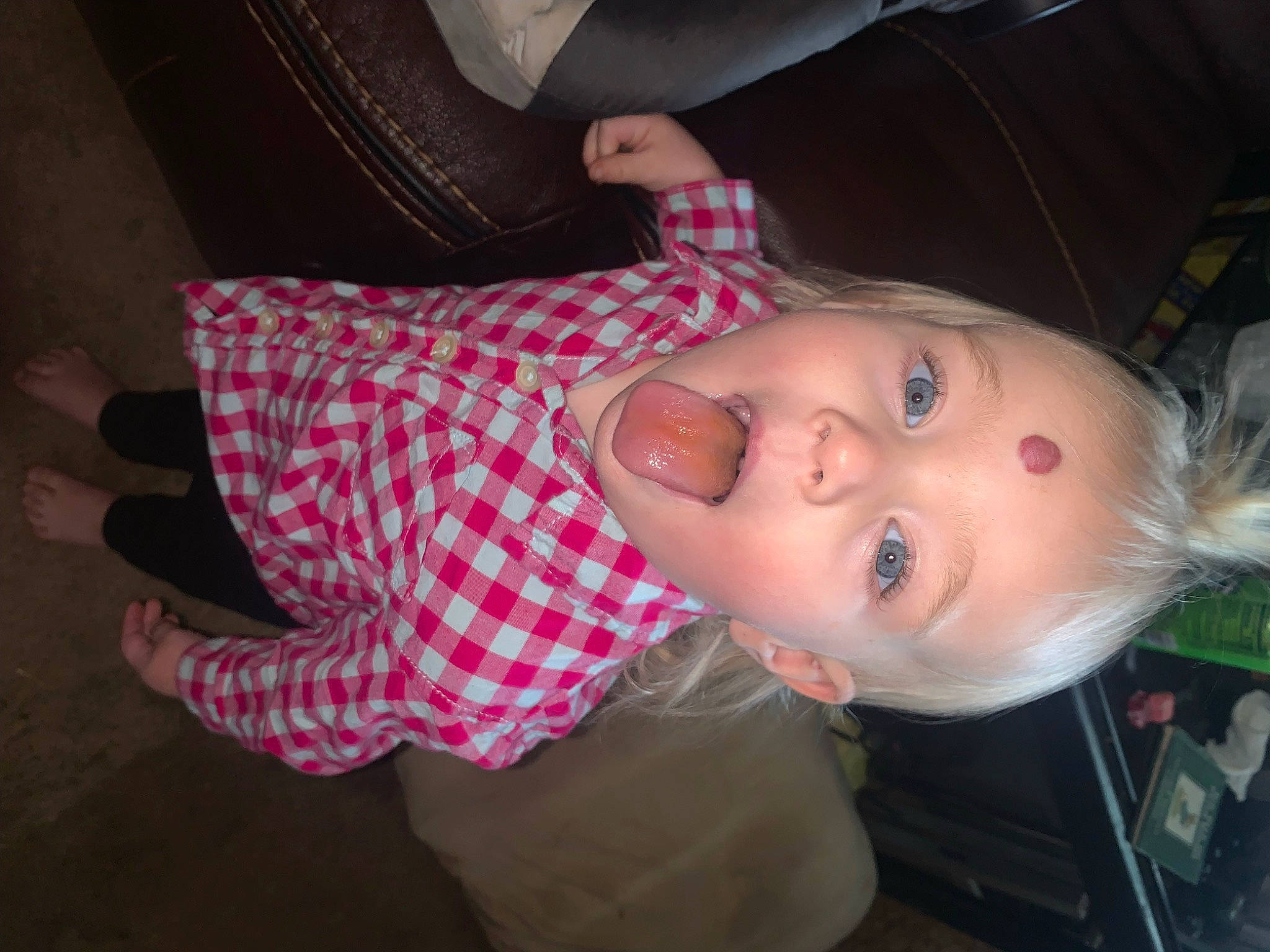 Lindsey is registered to the contest to win money with this photo: baby, baby_toddler_clothing, cheek, child, ear, eyebrow, eyelash, fun, iris, lip, mouth, nail, nose, pattern, person, skin, sunglasses, surprise, toddler