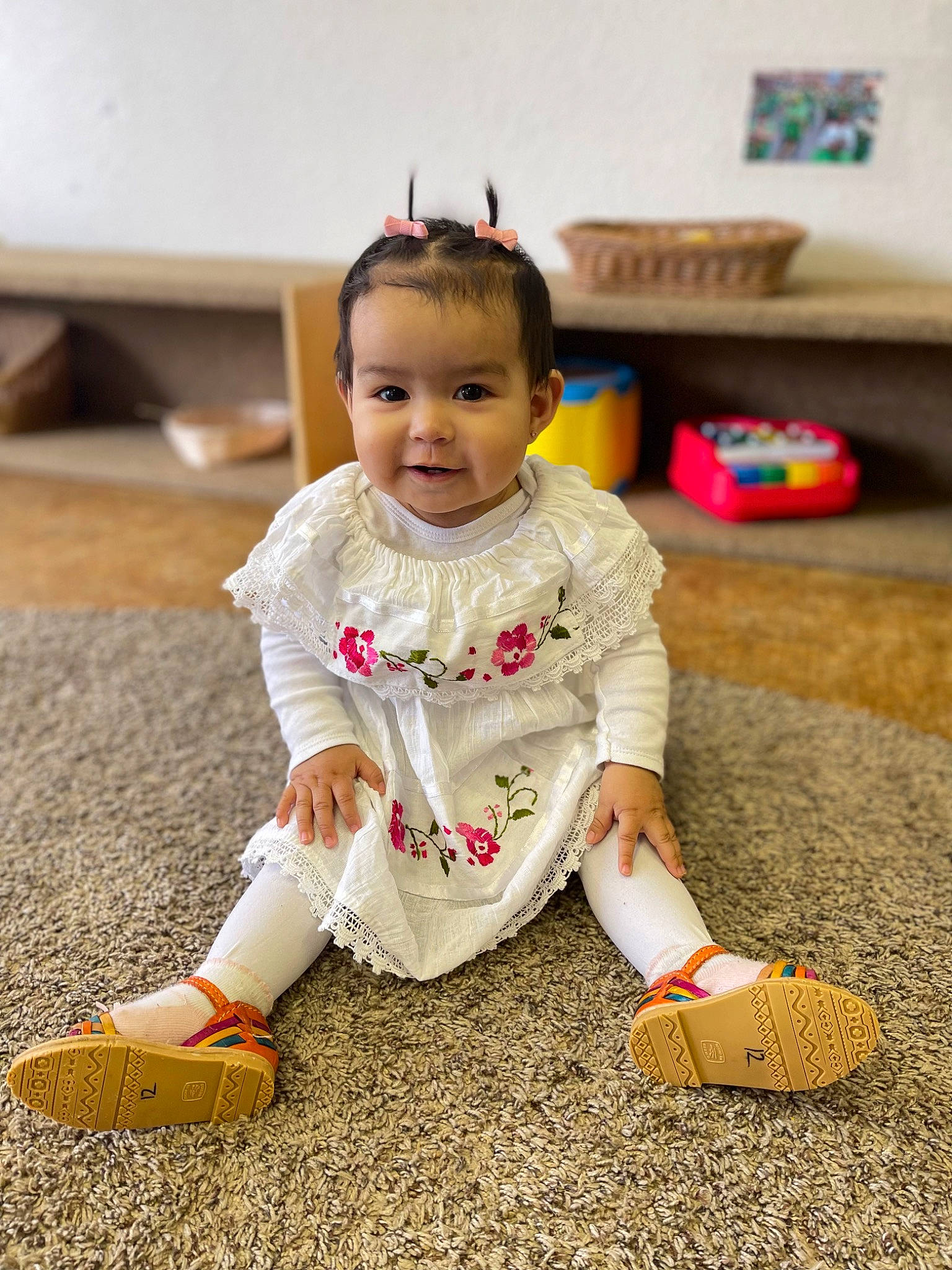 Abigail joined the competition — help win amazing prizes! baby, baby_toddler_clothing, child, dress, face, flooring, foot, footwear, fun, grass, happy, human_leg, person, play, room, shoe, sitting, sleeve, smile, toddler