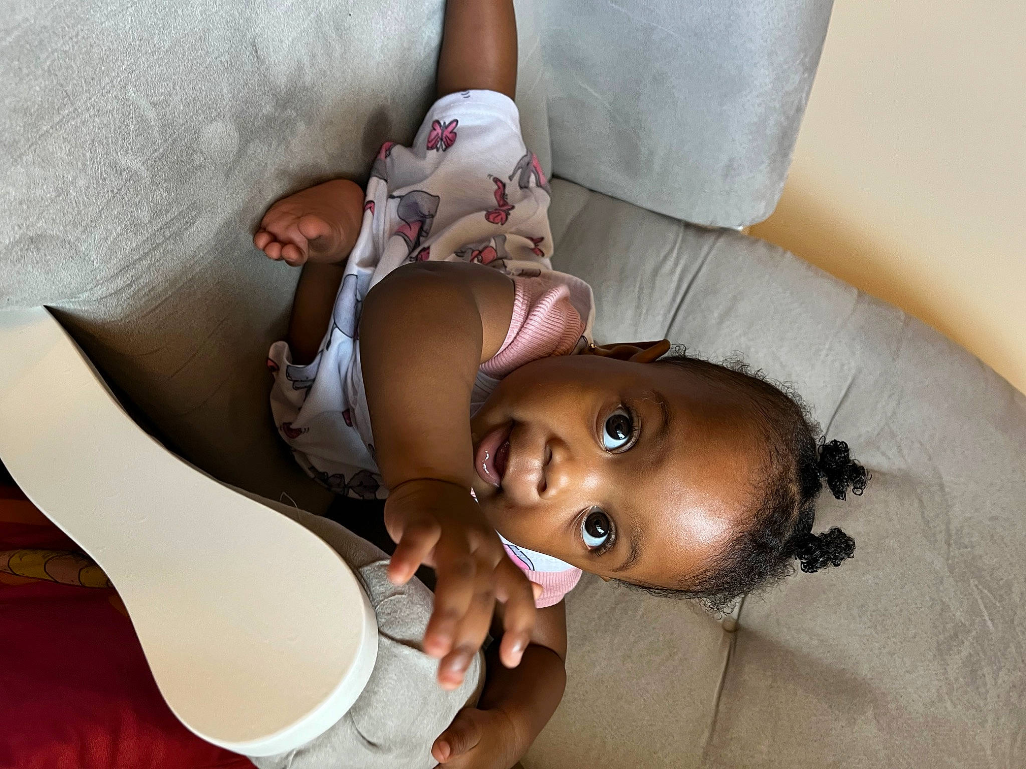 Melanie is registered to the contest to win money with this photo: arm, baby, baby_products, child, comfort, doll, elbow, finger, hand, hat, human_leg, joint, knee, person, room, sitting, stuffed_toy, thigh, toddler, toy