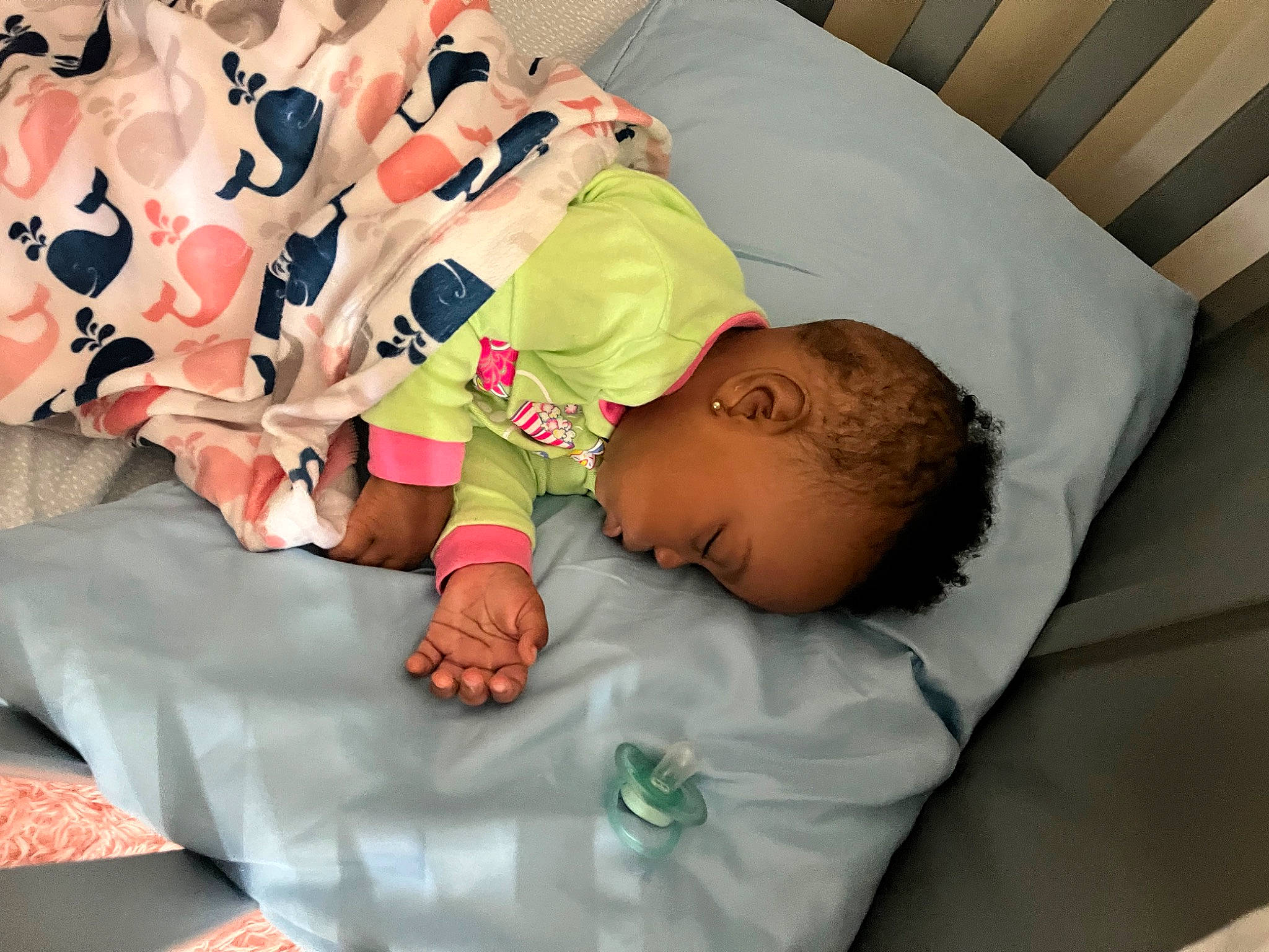 Melanie is registered to the contest to win money with this photo: arm, baby, baby_products, baby_sleeping, baby_toddler_clothing, bedtime, carmine, child, comfort, eye, happy, head, linens, nap, pattern, person, product, room, sleeve, t_shirt