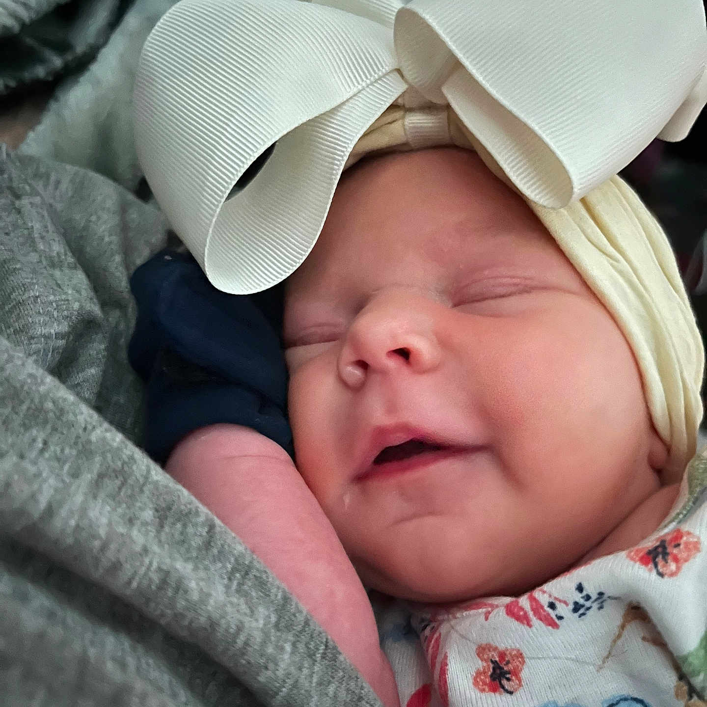 Kariyah joined the competition — help win amazing prizes! apparel, baby, blanket, bow, child, closeup, cozy, cute, face, flower_pattern, hand, headband, infant, newborn, peaceful, portrait, rest, skin, sleeping, soft