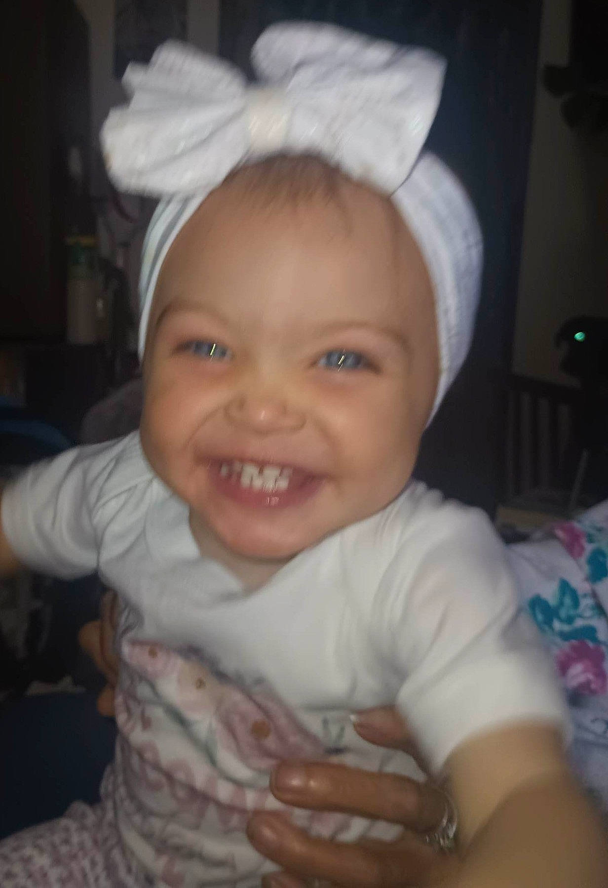 Amaria is registered to the contest to win money with this photo: arm, baby, cap, cheek, child, chin, cool, ear, eye, eyebrow, forehead, happy, iris, joy, lip, mouth, nose, person, skin, sleeve