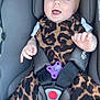 baby, car_seat, smiling, headband, leopard_print, clothing, infant, child, harness, sitting, happy, cute, toddler, seatbelt, purple_pacifier, white_shirt, safety, indoor, person, portrait