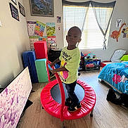 Antoine joined the competition — help win amazing prizes! child, trampoline, bedroom, toys, posters, window, bed, floor, shoes, clothing, light, wall, furniture, flooring, education, play, indoor, person, young, colorful