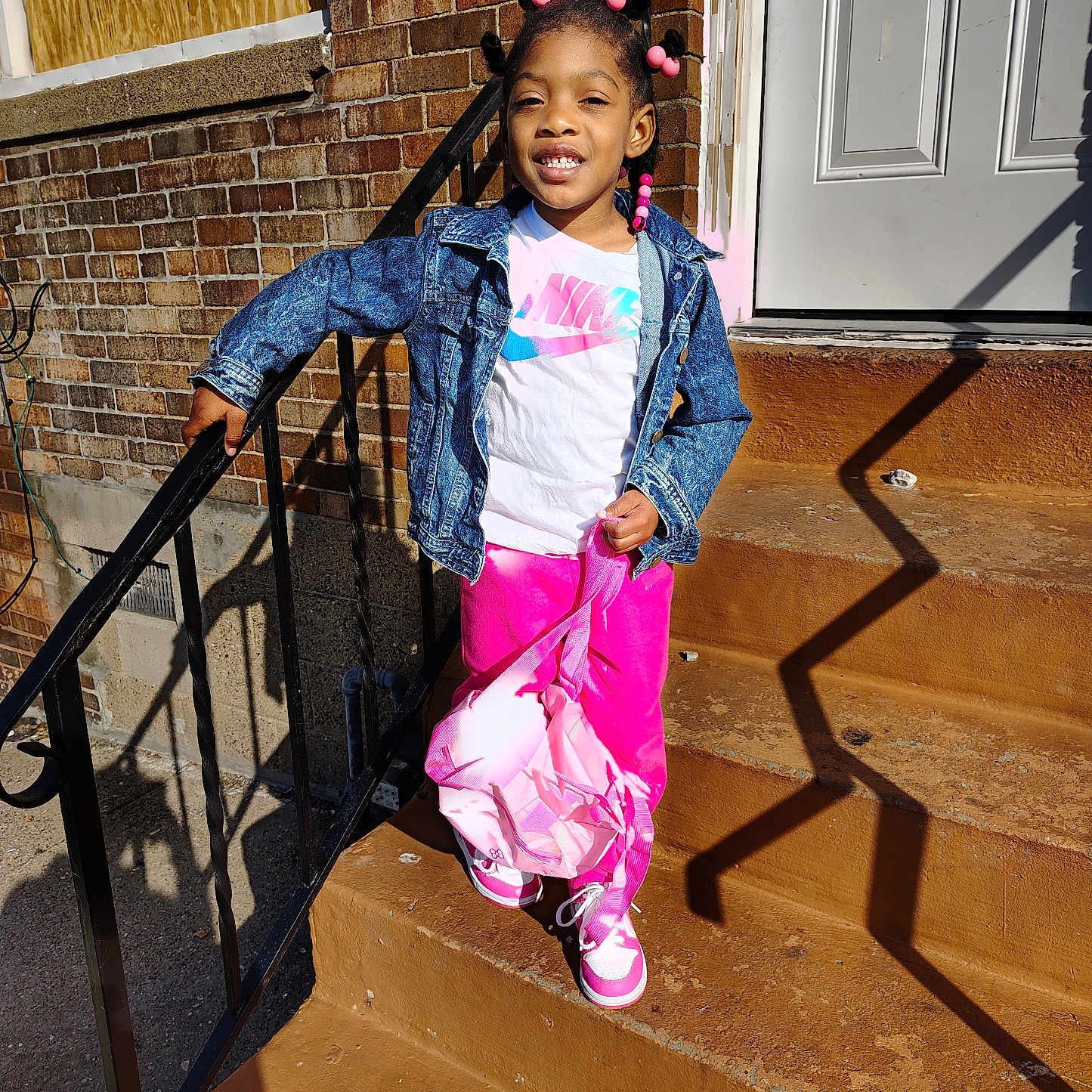 Jazeriah joined the competition — help win amazing prizes! architecture, building, child, clothing, coat, face, female, girl, handrail, hardwood, head, house, housing, jacket, pants, person, photography, portrait, staircase, wood