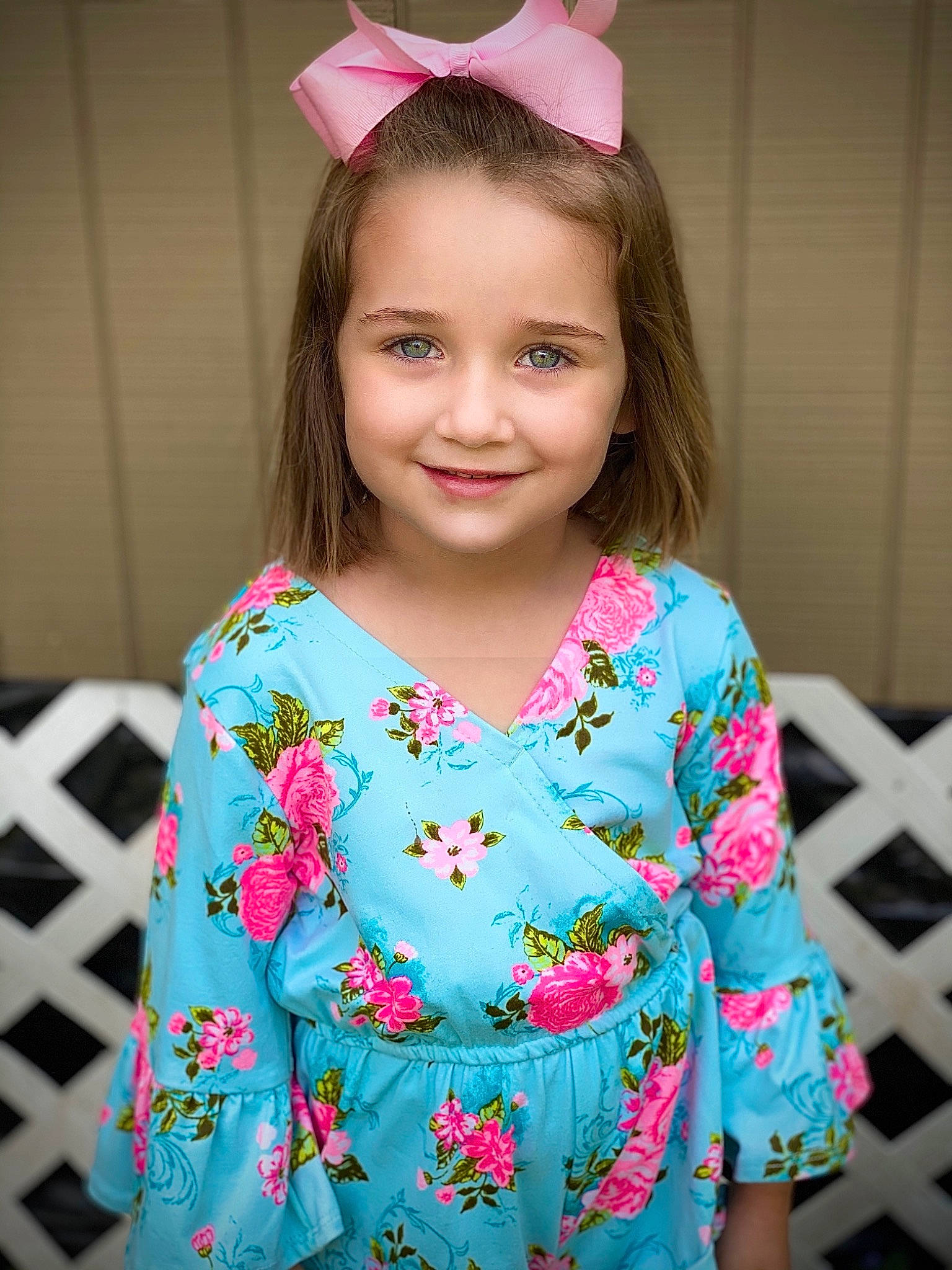 Ashlyn is registered to the contest to win money with this photo: baby_toddler_clothing, child, clothing, day_dress, dress, event, facial_expression, fashion, hairstyle, happy, headpiece, joy, magenta, one_piece_garment, outerwear, person, pink, skin, sleeve, smile