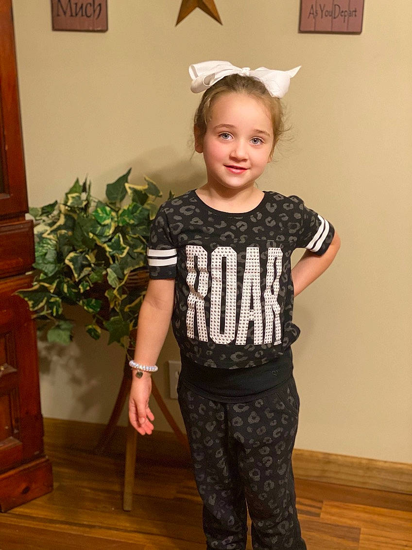 Ashlyn is registered to the contest to win money with this photo: baby_toddler_clothing, event, fashion_accessory, fashion_design, flooring, fun, happy, hardwood, joy, knee, pattern, person, plant, shoulder, sleeve, smile, t_shirt, toddler, trunk, waist