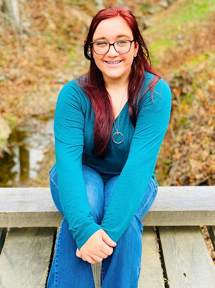 Kaleigh joined the competition — help win amazing prizes! azure, blue, electric_blue, eyewear, face, flash_photography, glasses, grass, hair, happy, head, joy, knee, people_in_nature, person, smile, standing, street_fashion, thigh, vision_care