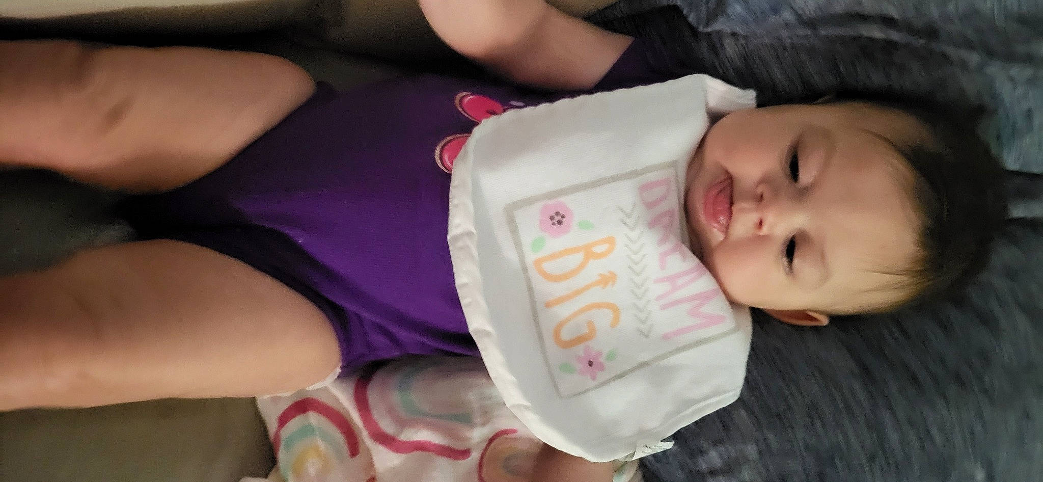 Kaylee is registered to the contest to win money with this photo: baby, baby_toddler_clothing, cheek, child, comfort, elbow, eyelash, face, finger, hand, happy, head, human_body, lip, mouth, nose, person, pink, skin, sleeve