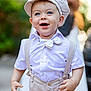 toddler, child, boy, smiling, happy, outdoor, suspenders, bow_tie, hat, cap, white_shirt, fashion, portrait, cute, face, person, young_child, clothing, daylight, background_blur