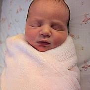 Zeniyah joined the competition — help win amazing prizes! newborn, baby, sleeping, blanket, pink, soft, wrapped, face, peaceful, infant, closeup, head, skin, child, indoors, portrait, cute, resting, young, swaddled