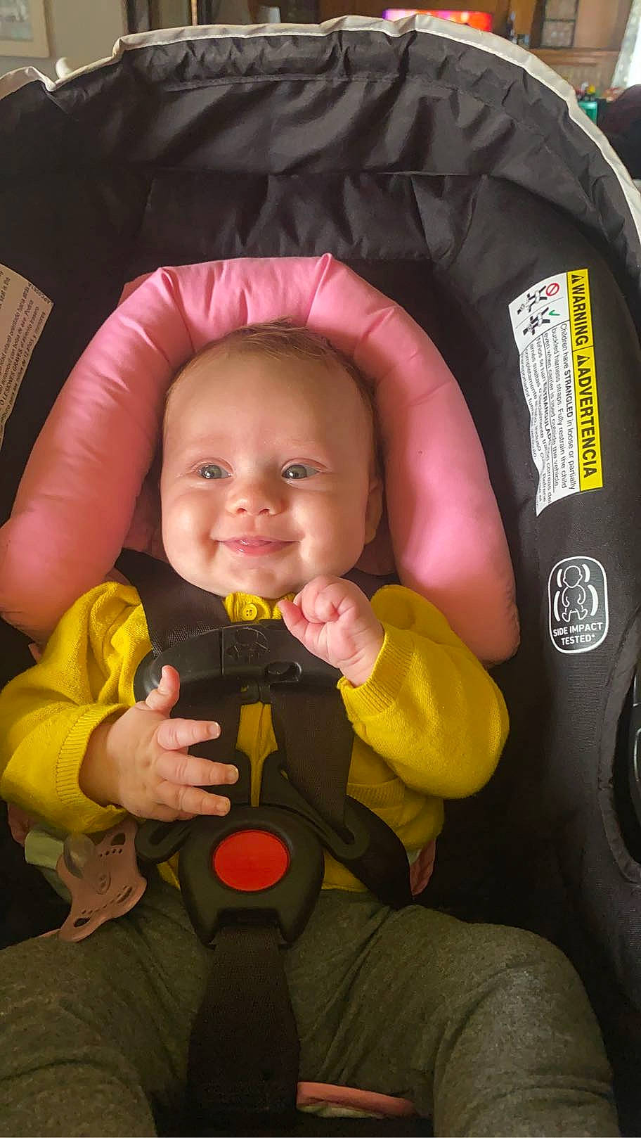 Ryleigh joined the competition — help win amazing prizes! baby, baby_carriage, baby_toddler_clothing, car_seat, cheek, comfort, eye, finger, gesture, happy, head, joy, mouth, nose, orange, person, product, skin, smile, thumb