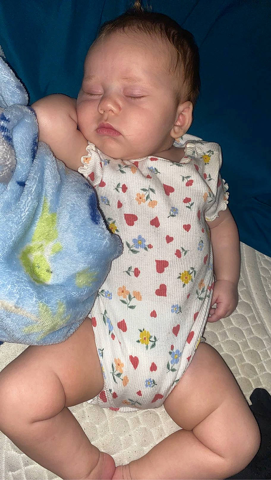 Ryleigh is registered to the contest to win money with this photo: arm, baby_toddler_clothing, cheek, comfort, eye, face, facial_expression, hand, head, human_body, leg, lip, mouth, neck, nose, organ, person, product, skin, sleeve