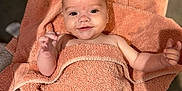 Elijah joined the competition — help win amazing prizes! baby, towel, smiling, face, child, skin, hand, floor, tile, indoor, happy, portrait, infant, blanket, cute, young, person, wrapped, expression, warm