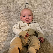 Oliver joined the competition — help win amazing prizes! baby, infant, smiling, couch, beige_clothing, sitting, cute, indoor, portrait, child, happy, cozy, face, baby_clothes, wood_floor, texture, furniture, young_child, buttoned_shirt, sock