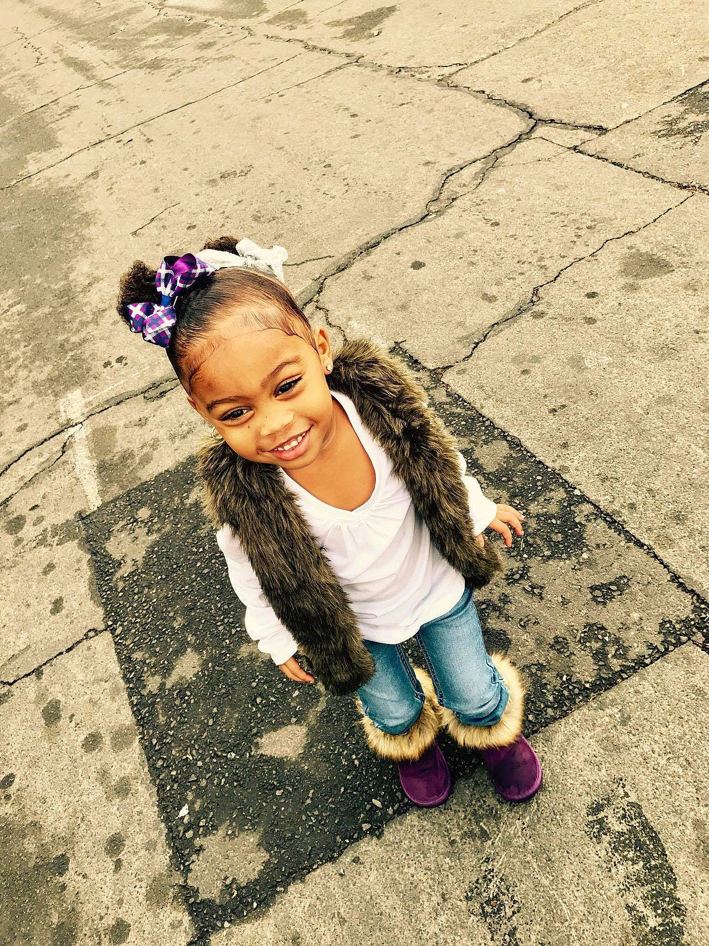 Ja'Maya is registered to the contest to win money with this photo: child, fun, girl, happiness, headgear, joy, material, person, photograph, pink, play, purple, sand, skin, smile, toddler, vacation