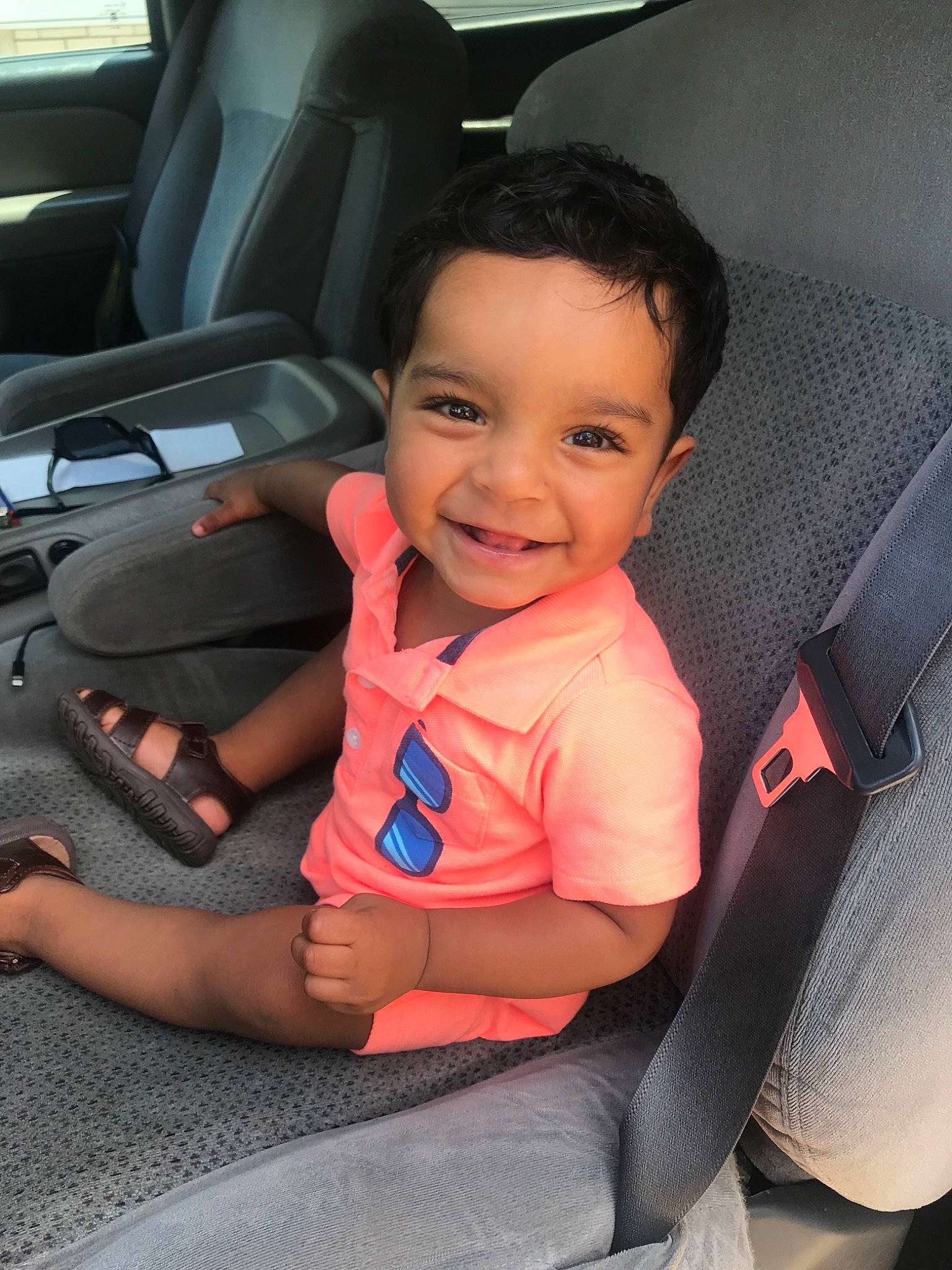 Ari joined the competition — help win amazing prizes! auto_part, baby, baby_in_car_seat, car, car_seat, car_seat_cover, child, family_car, joy, person, seat_belt, sitting, smile, toddler, vacation, vehicle