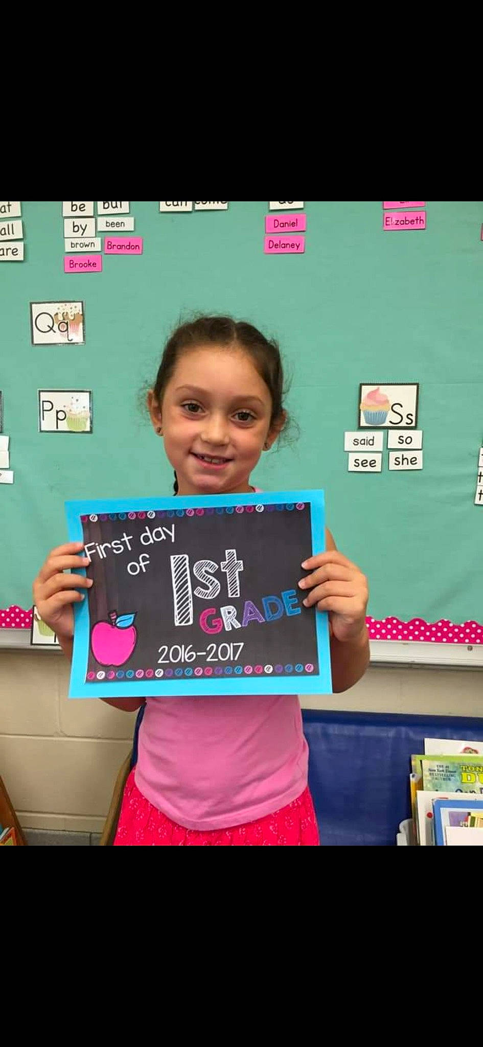 Kahlia joined the competition — help win amazing prizes! academic_institution, blackboard, child, class, classroom, education, event, handwriting, happy, job, joy, learning, person, play, room, school, slate, smile, t_shirt, teacher