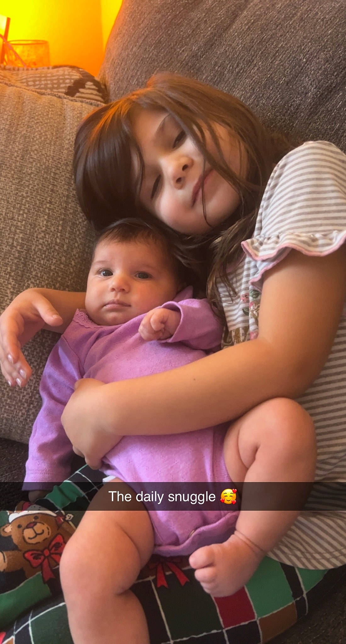 Emberly joined the competition — help win amazing prizes! arm, baby, black_hair, child, comfort, eye, facial_expression, finger, flash_photography, hand, happy, leg, leisure, muscle, organ, person, pink, purple, skin, thigh