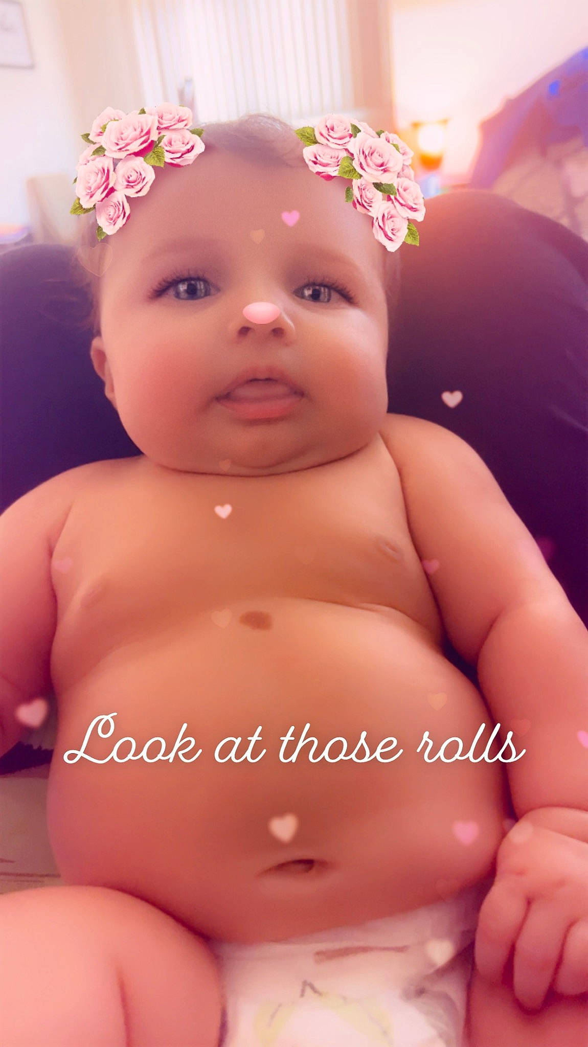 Anna is registered to the contest to win money with this photo: arm, baby, cheek, chest, chin, eye, eyebrow, eyelash, facial_expression, finger, hand, happy, head, human_body, mouth, muscle, nose, person, pink, skin