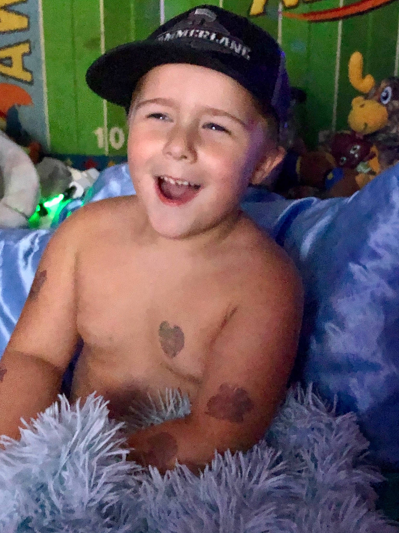 Evan joined the competition — help win amazing prizes! barechested, chest, chest_hair, child, headwear, joy, muscle, person, smile