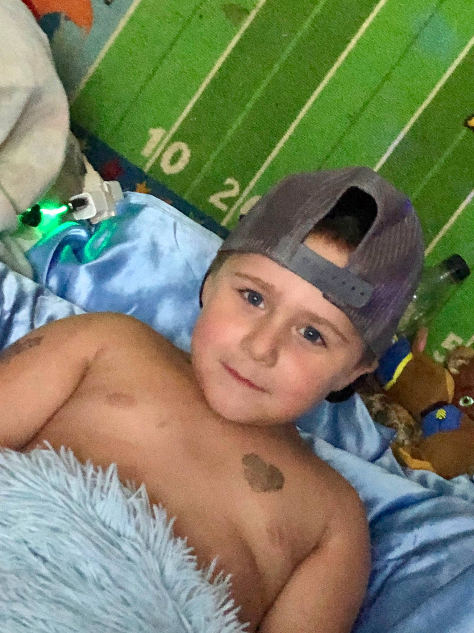 Evan is registered to the contest to win money with this photo: barechested, chest, chest_hair, child, headwear, muscle, person, photography, selfie, trunk