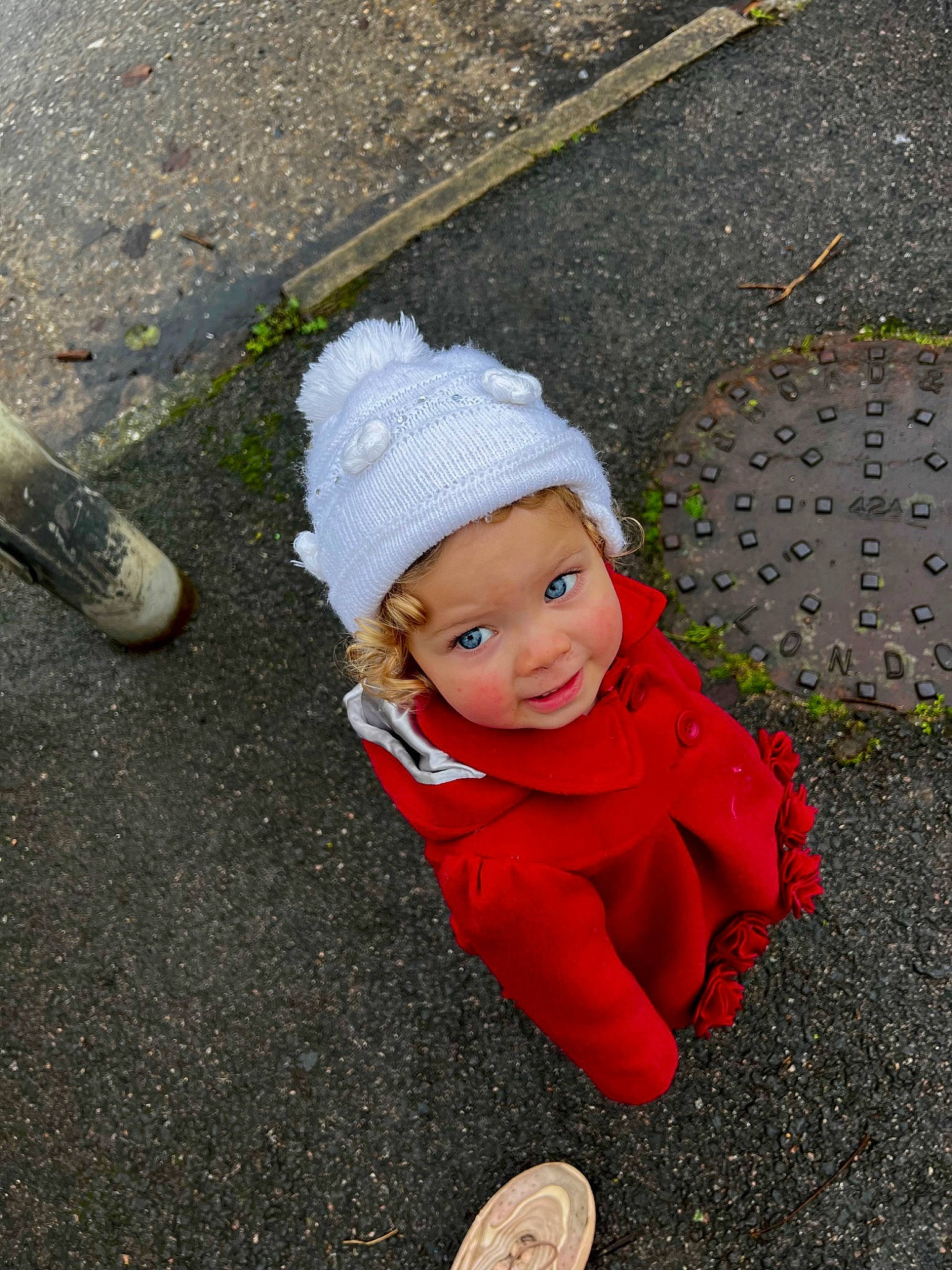 Iyla-rose is registered to the contest to win money with this photo: asphalt, cap, child, concrete, curb, fashion_accessory, flooring, grass, happy, hat, headwear, people_in_nature, person, road, road_surface, sidewalk, smile, soil, tar, toddler