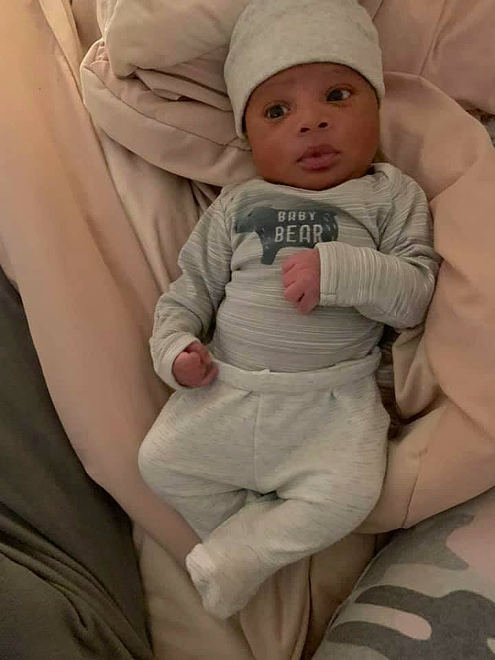 Cason joined the competition — help win amazing prizes! baby, baby_products, baby_toddler_clothing, cap, cheek, child, comfort, face, gesture, happy, headgear, headwear, linens, lip, person, room, sitting, skin, sleeve, smile