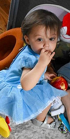 Elle joined the competition — help win amazing prizes! baby, baby_toddler_clothing, child, face, finger, food, fruit, fun, gesture, hair, happy, mcintosh, mouth, natural_foods, person, photograph, plant, sitting, thigh, thumb