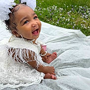 Autumn joined the competition — help win amazing prizes! baby, child, smiling, white_dress, lace, pearls, feathers, grass, flowers, outdoor, cute, happy, portrait, sitting, accessories, headwear, infant, nature, celebration, joyful