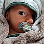 baby, blanket, pacifier, face, infant, wrapped, cozy, soft, closeup, child, newborn, sleepwear, warm, cute, young, portrait, comfort, resting, indoors, expression