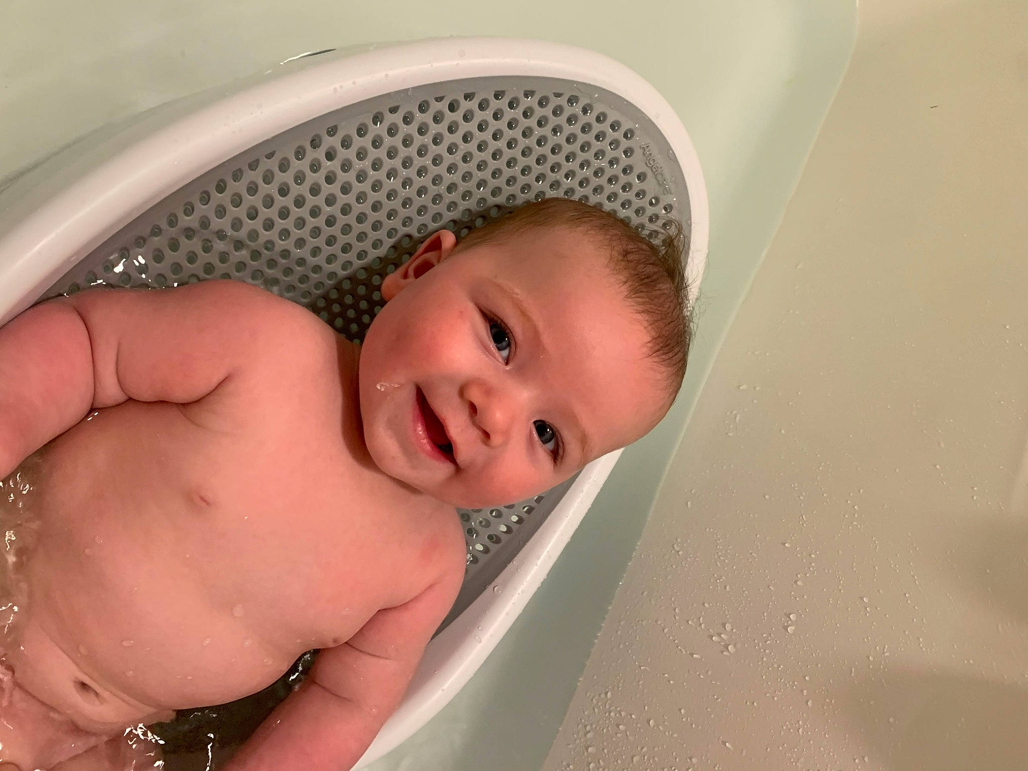 Hudson is registered to the contest to win money with this photo: abdomen, baby, baby_products, bathing, cheek, chest, child, comfort, eye, eyebrow, human_body, jewellery, joy, nail, person, product, skin, smile, stomach, thumb