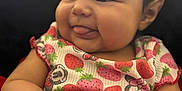 Nova joined the competition — help win amazing prizes! baby, child, infant, face, tongue, red_bows, strawberry_print, dress, hands, blanket, cute, smiling, chubby_cheeks, portrait, indoors, close_up, soft_light, happy, person, young