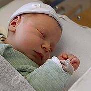 Owen participe au concours pour gagner de l'argent avec cette photo : newborn, baby, sleeping, blanket, hat, hand, soft, cozy, infant, cute, peaceful, child, portrait, indoors, clothing, rest, sleep, closeup, nursery, comfort