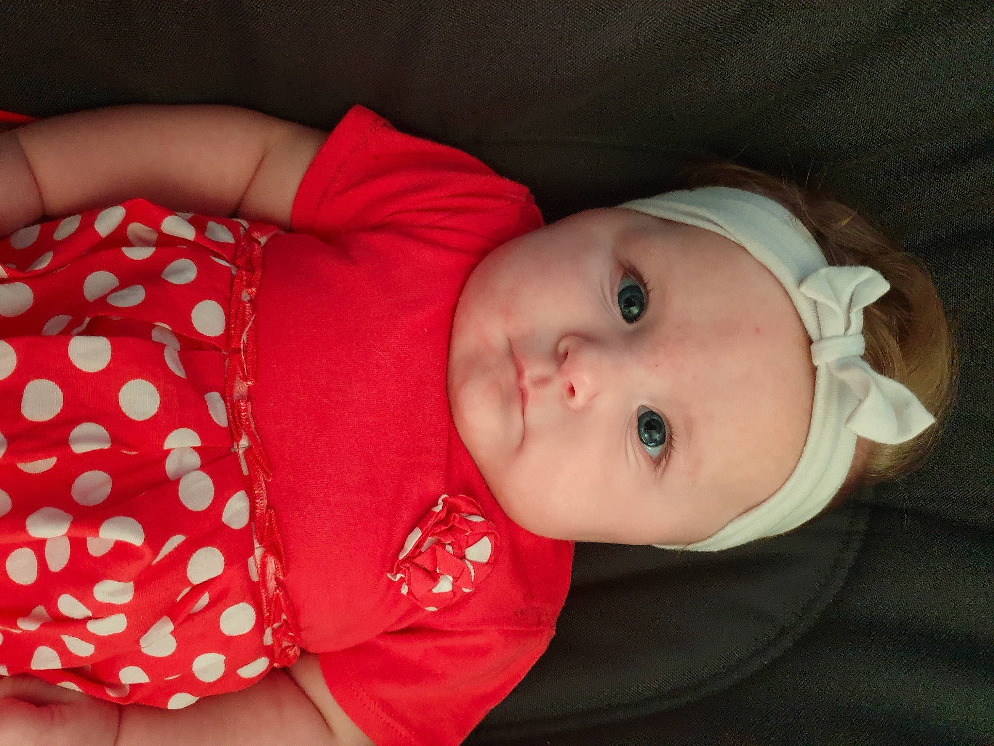 Lindsay participe au concours pour gagner de l'argent avec cette photo : baby, baby_products, baby_toddler_clothing, cheek, child, comfort, hat, headgear, headwear, lip, nose, pattern, person, skin, sleeve, toddler