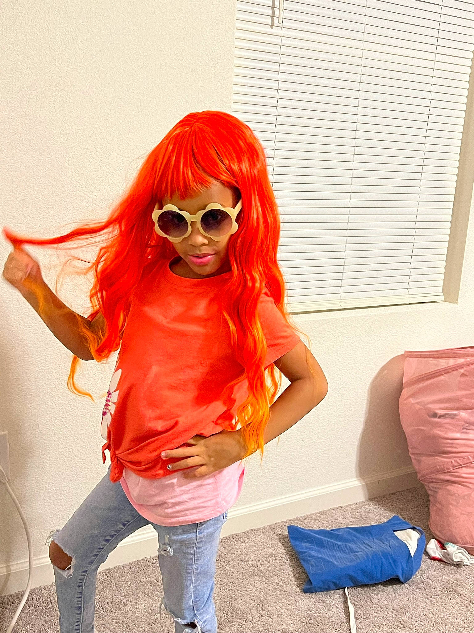 Kory Lynn is registered to the contest to win money with this photo: bangs, electric_blue, eyewear, fashion_design, goggles, human_leg, knee, layered_hair, long_hair, orange, person, red_hair, shoulder, sportswear, sunglasses, t_shirt, thigh, vision_care, waist, wig