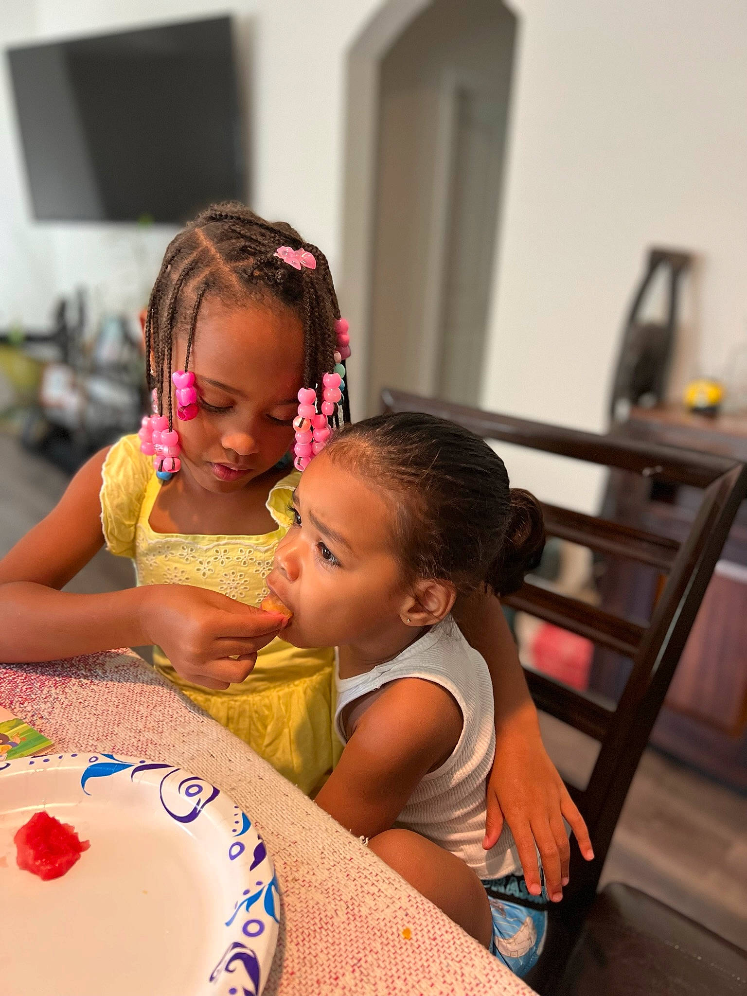 Kory Lynn is registered to the contest to win money with this photo: art, baby, cake_decorating, chair, child, dishware, event, fun, hair, happy, icing, leisure, person, plate, play, room, sweetness, t_shirt, table, tableware