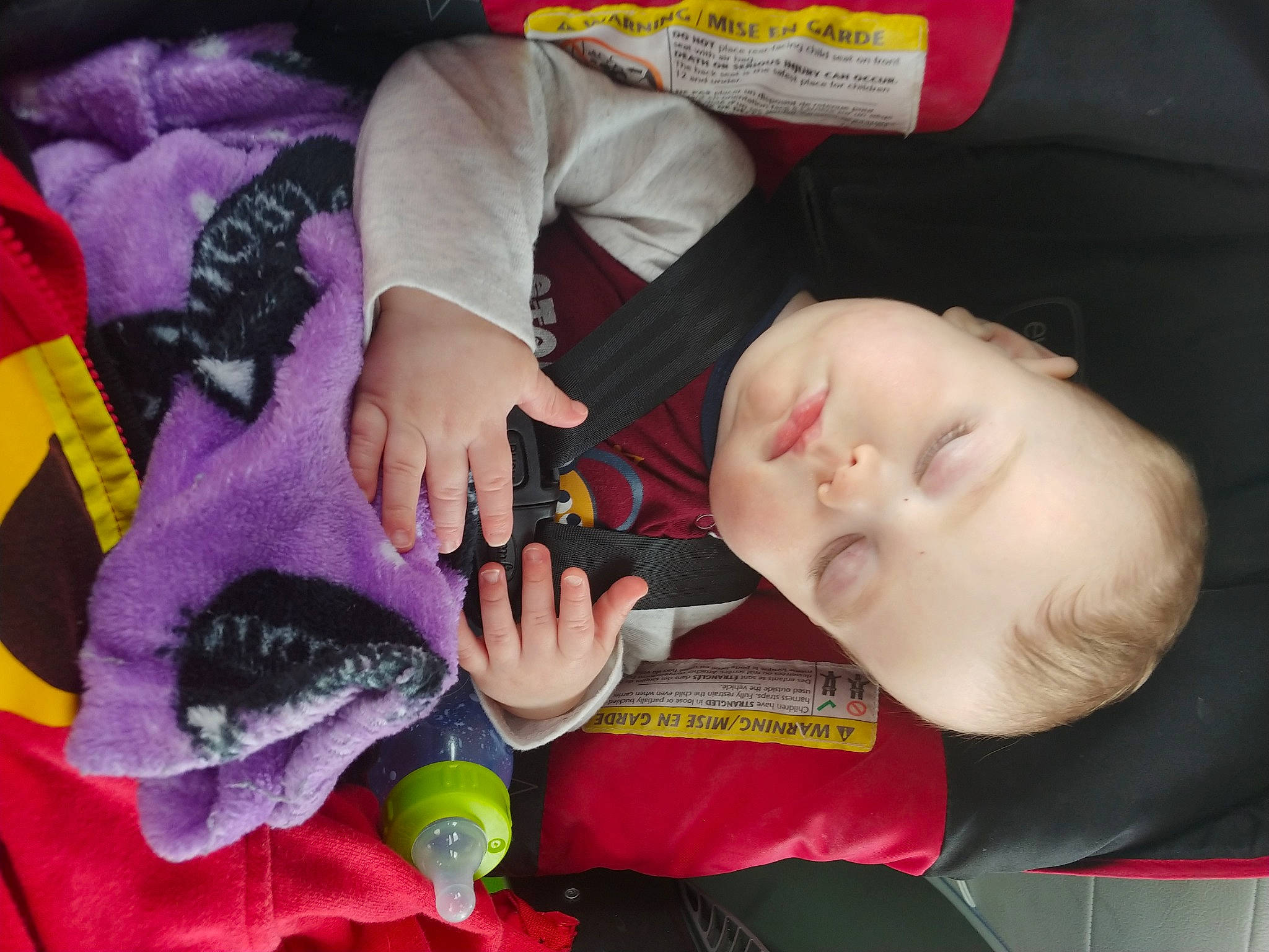 Brigham is registered to the contest to win money with this photo: baby, baby_products, baby_toddler_clothing, baby_toys, bedtime, cheek, child, comfort, finger, linens, nail, nap, person, play, room, sitting, skin, stuffed_toy, toddler, toy